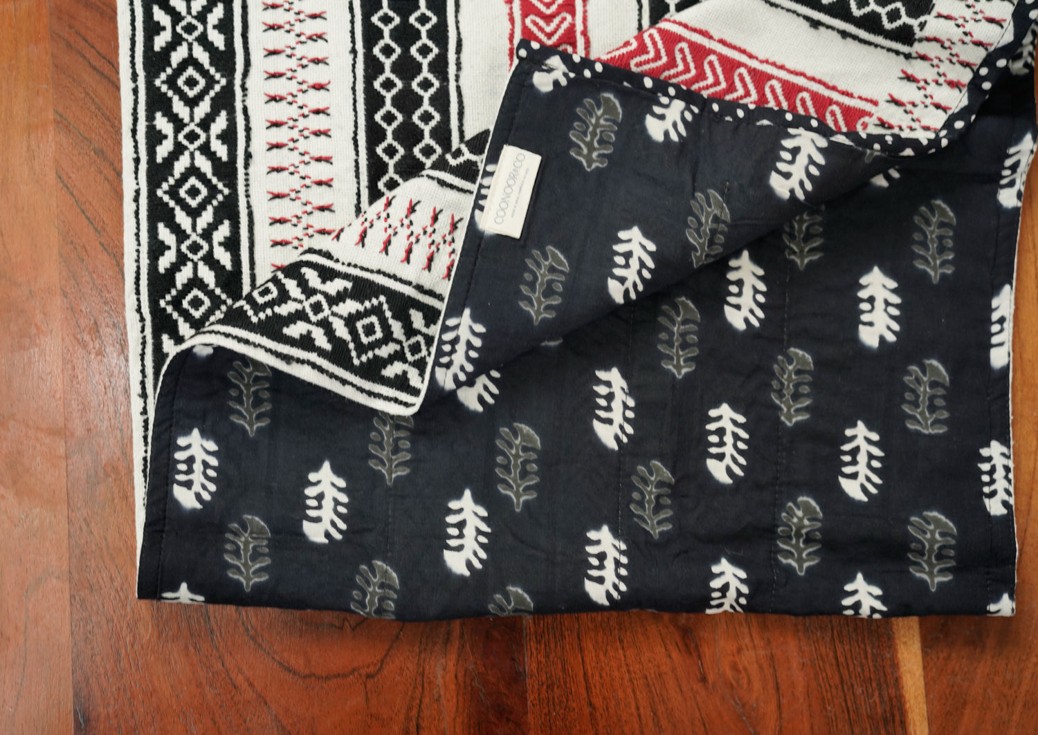 Detail of layered Toda pukhoor embroidery on Palimpsest Runner, thread-counted without frames