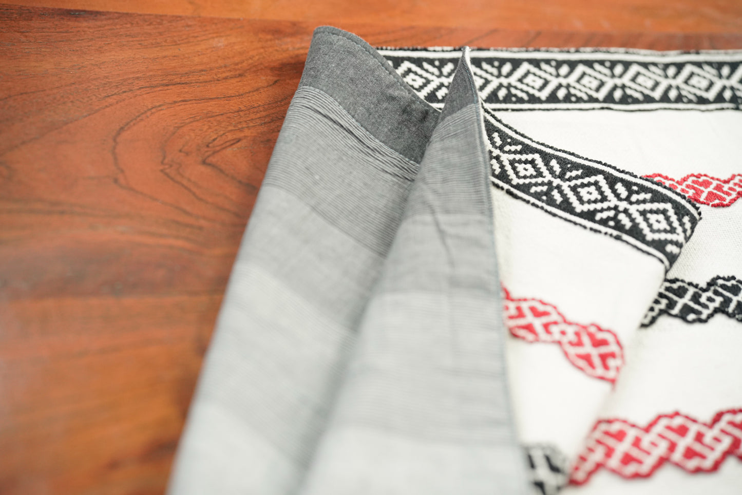 Meadow Runner styled on a table setting showing full length Toda embroidery