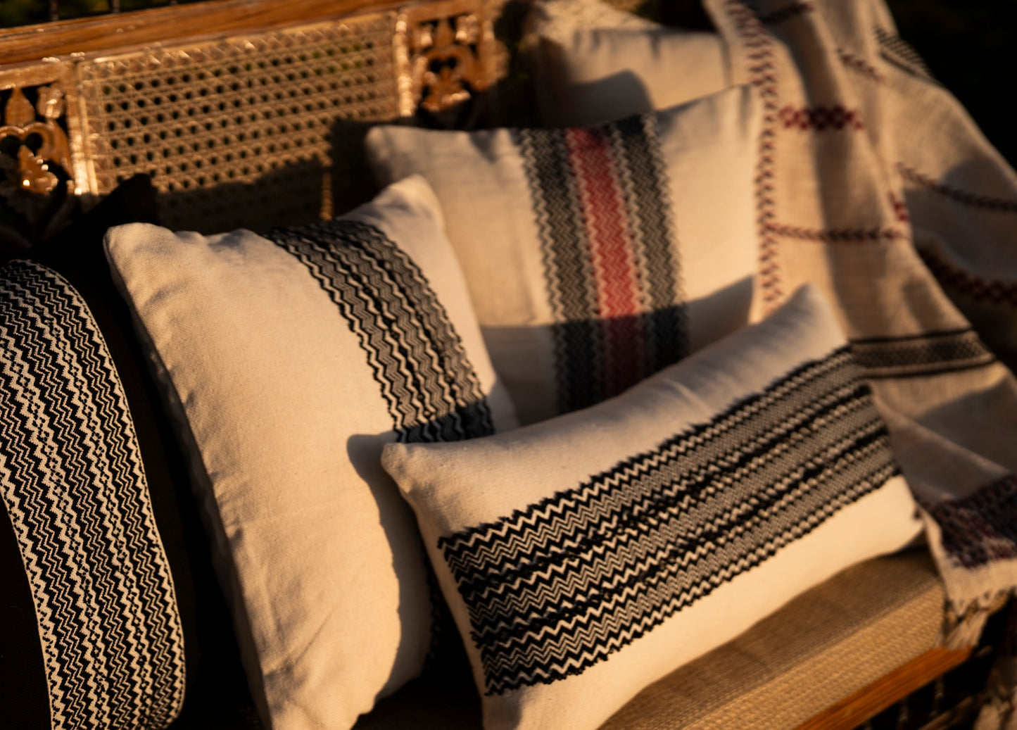 Mountains Black/Red cushion in reusable cotton dust bag, Coonoor & Co gifting