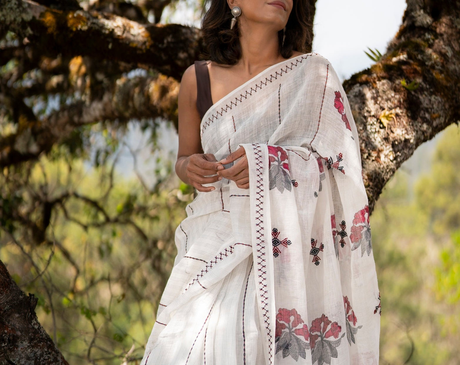 Full length view of Rhododendron Saree showing Toda embroidery running the length and edges