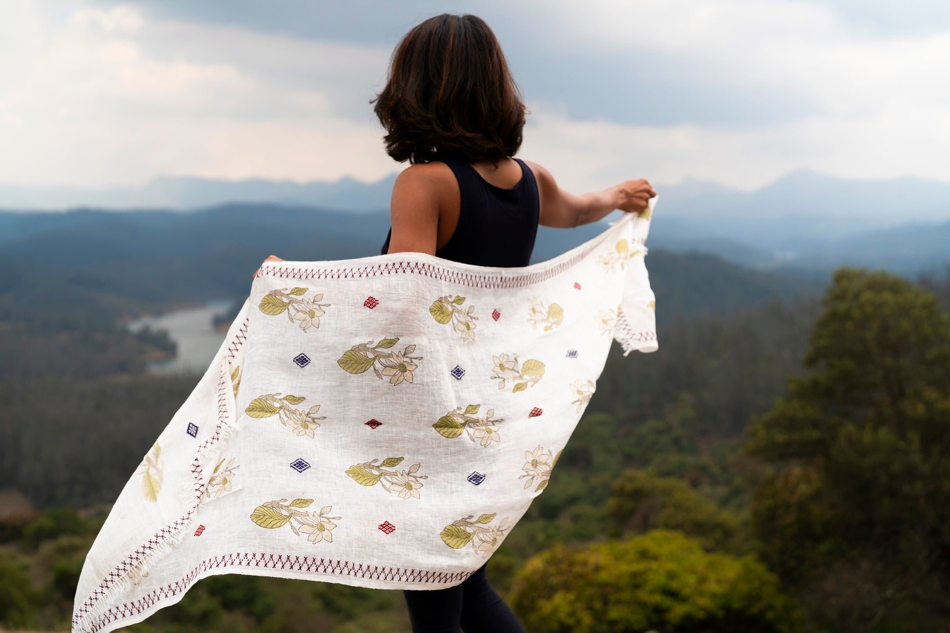 Detail of endemic Nilgiris magnolia block print with scattered Toda diamond pukhoor embroidery