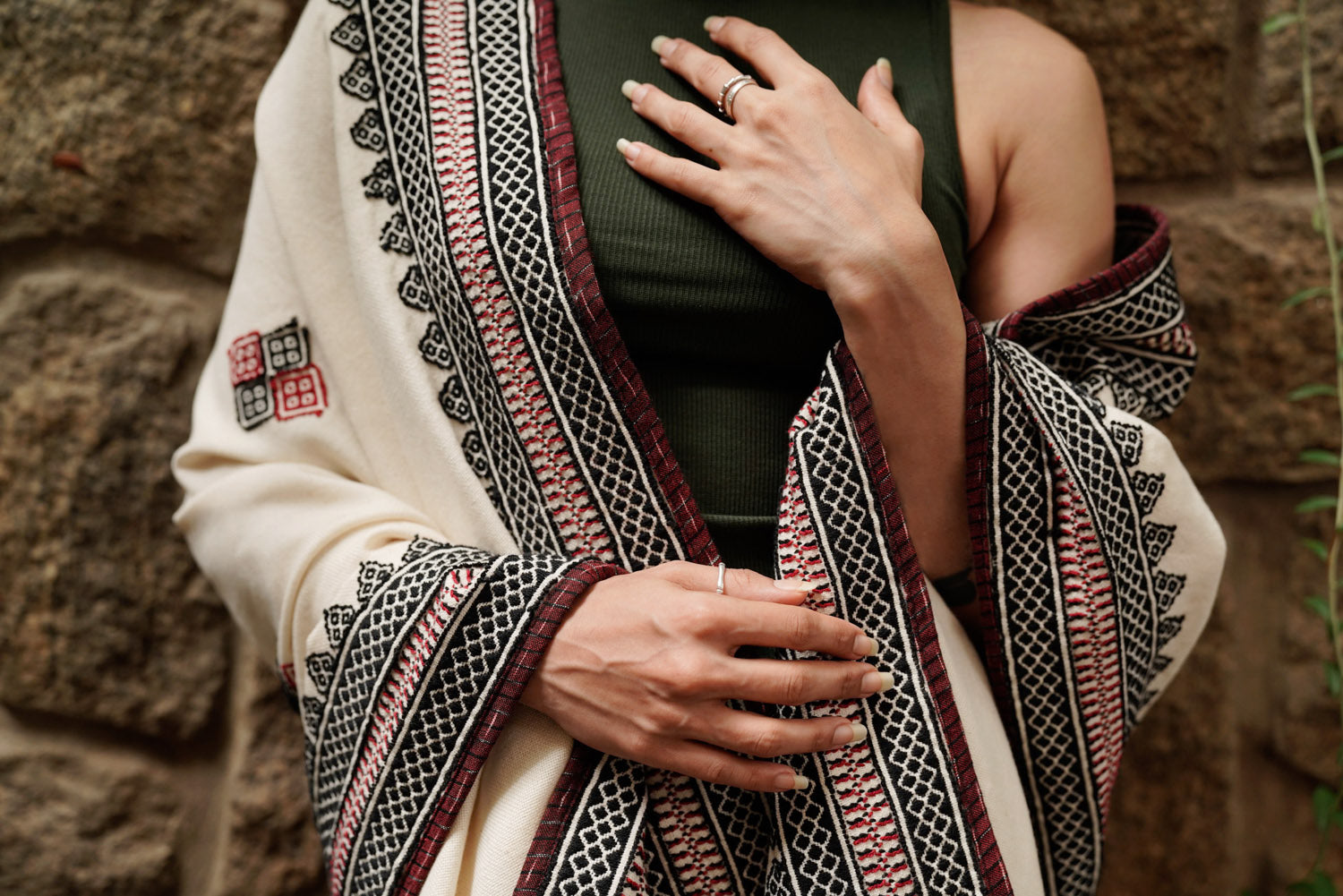 Full drape of Mishpuum Poof showing oversized format and reversible embroidery on Tencel