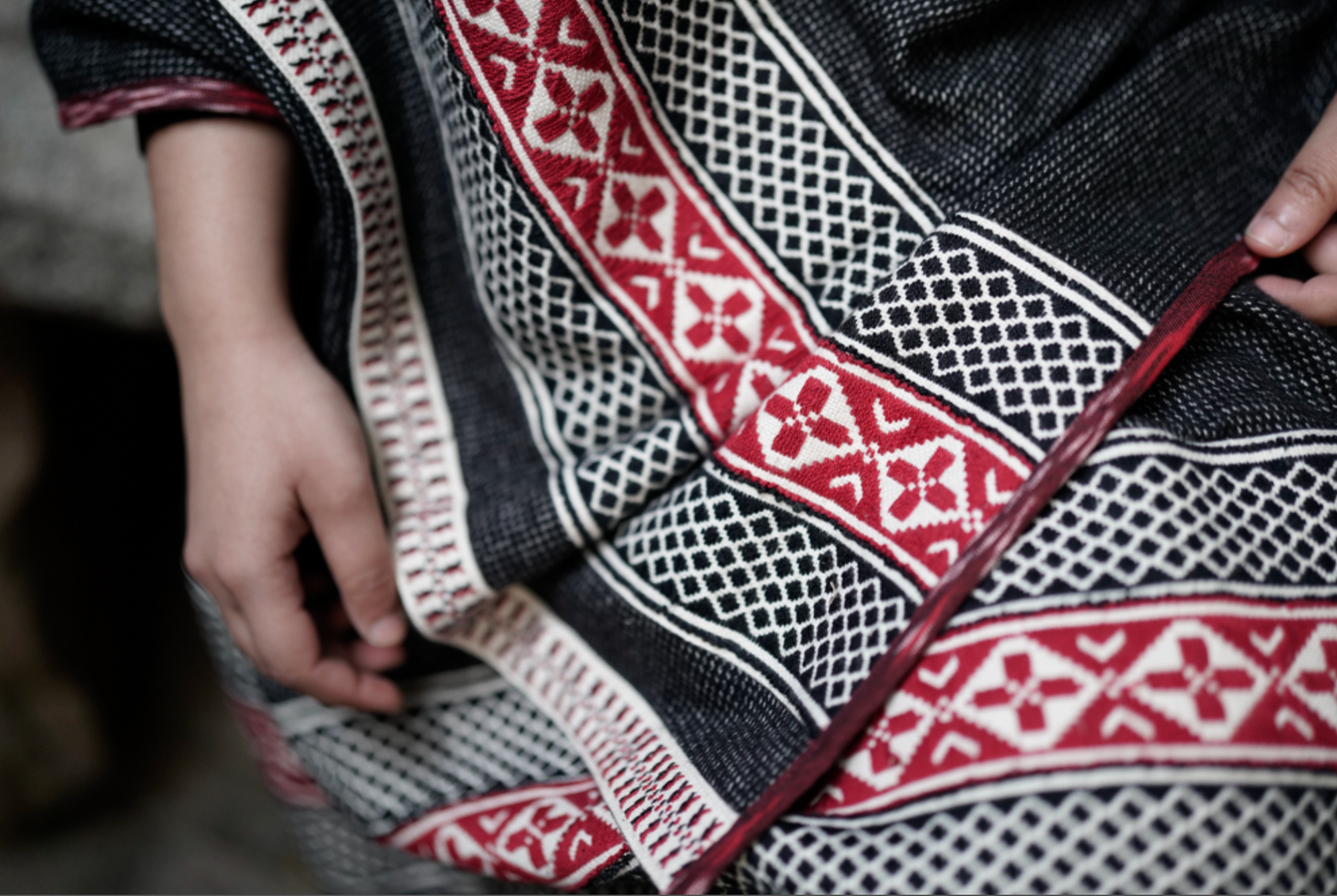 Full drape of Winter Weave Chevron shawl showing chevron borders and natural drape