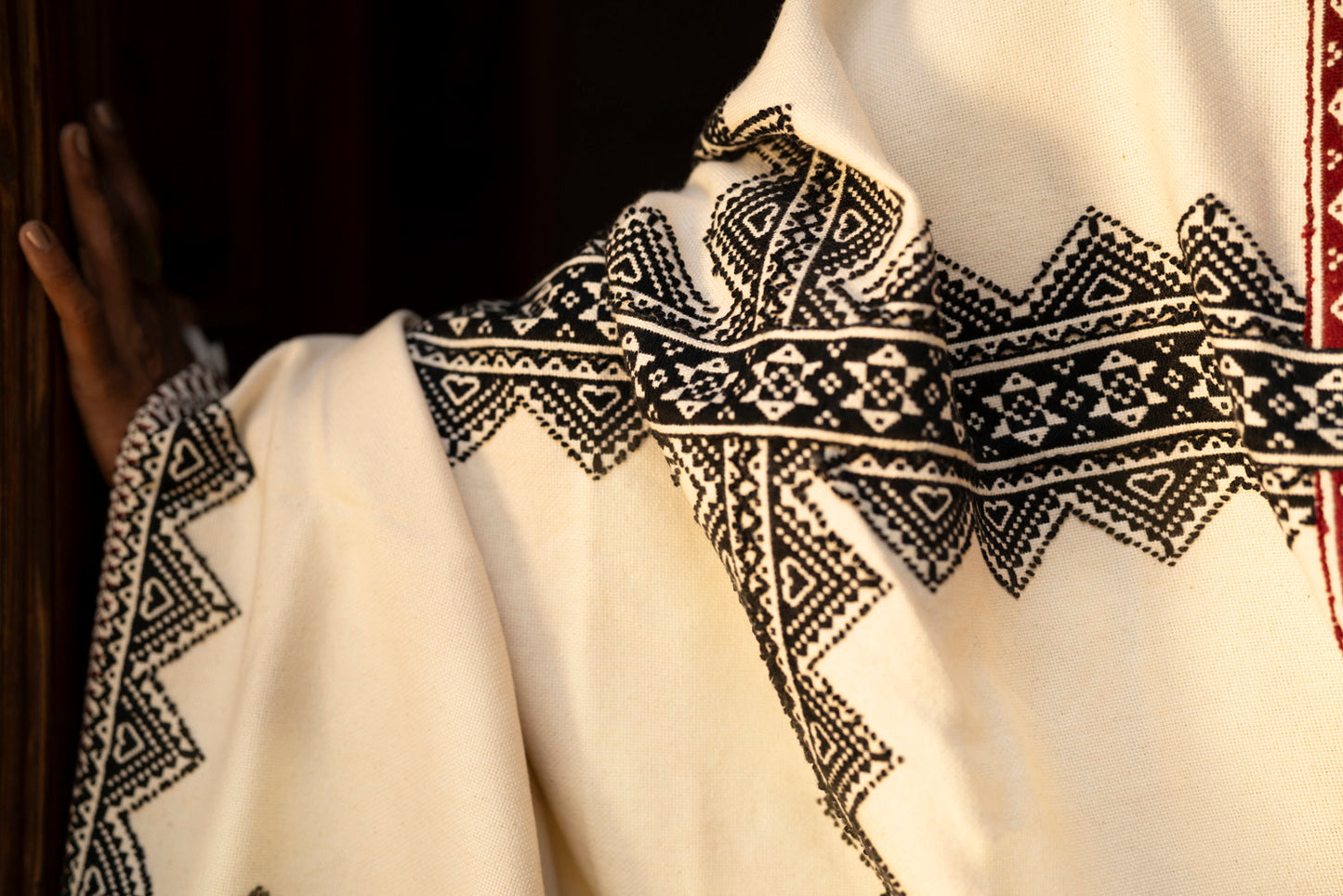 Full drape of Toda Landscape shawl showing reversible embroidery and landscape borders